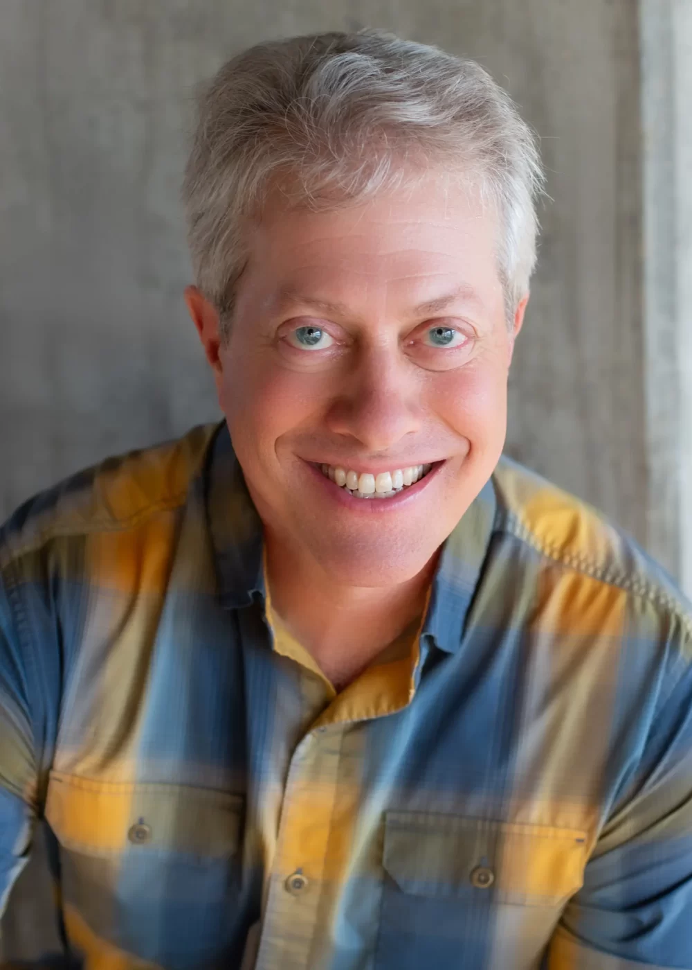 Scott Shimberg blue yellow shirt closeup smile PNG
