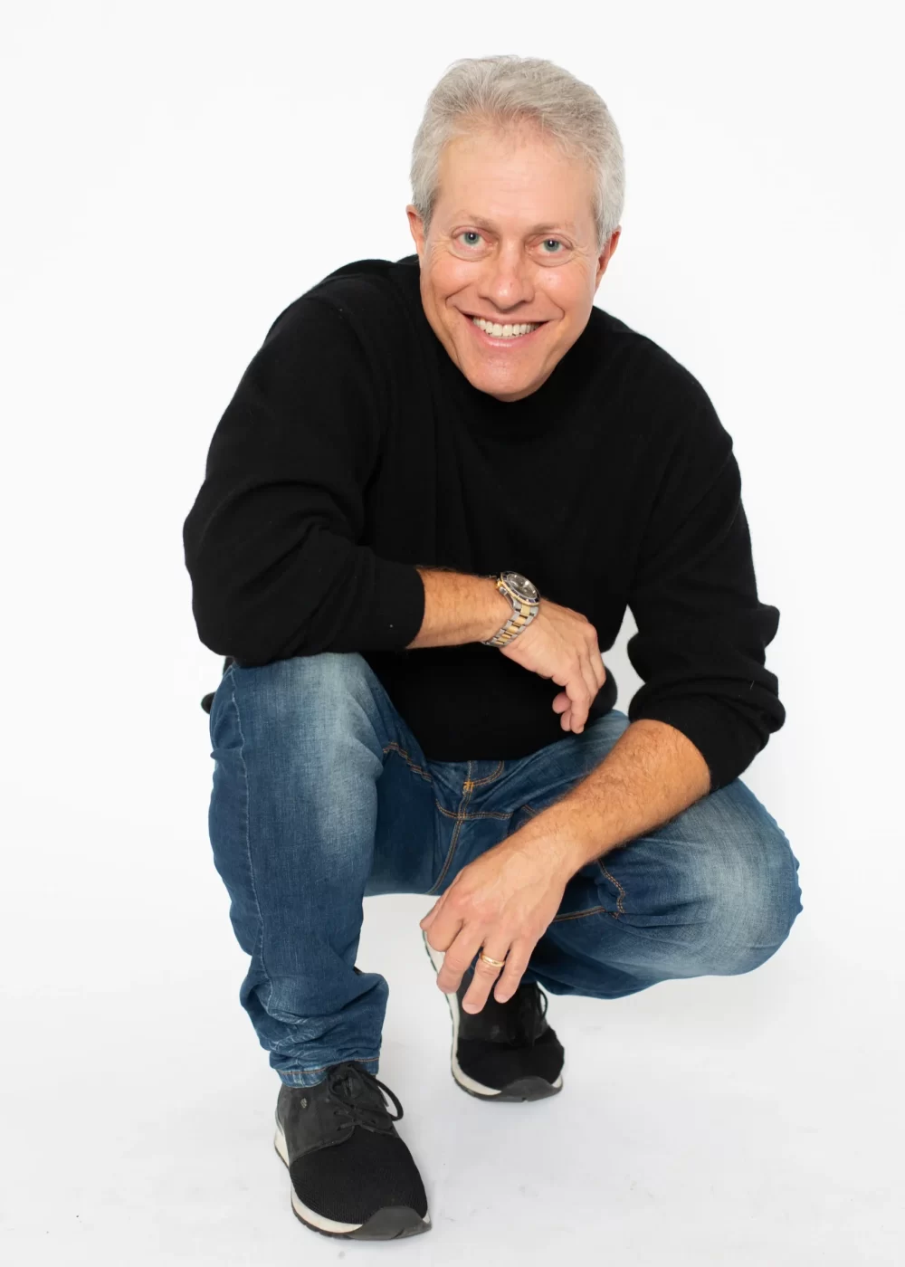 Scott Shimberg squatting in jeans 2 PNG