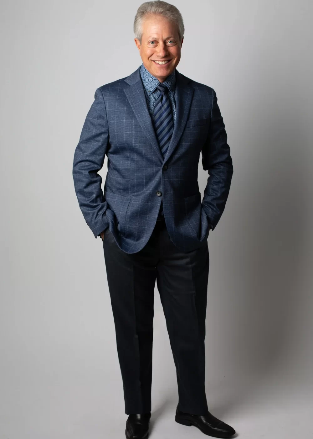 Scott Shimberg suit hands in pockets PNG